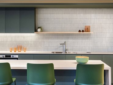 Cunsolo Architects extended their use of Corian® beyond the kitchen benches, seamlessly incorporating it into the design of kitchen tables 