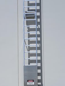 AM-BOSS Access Ladders Fall Protection System Ladline On Building Facade