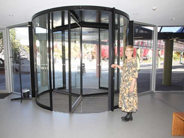 Claire Buchanan appreciates the comfort offered to visitors and HVAC energy conservation of the new Tourniket revolving door