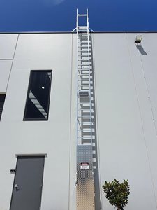AM-BOSS Access Ladders Fall Protection System Ladline On Building Exterior