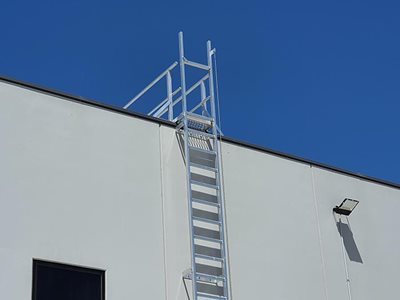 AM BOSS Access Ladders Fall Protection System Ladline on Side of Building 