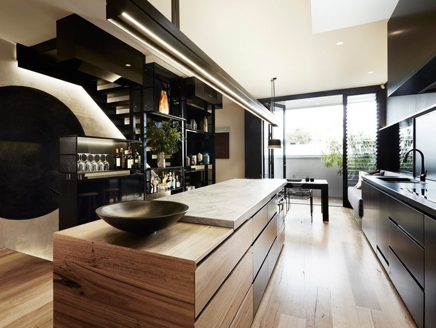 Black Moon Rising by&nbsp;Splinter Society&nbsp;Architecture features a modern kitchen.&nbsp;Photography by Armelle Habib
