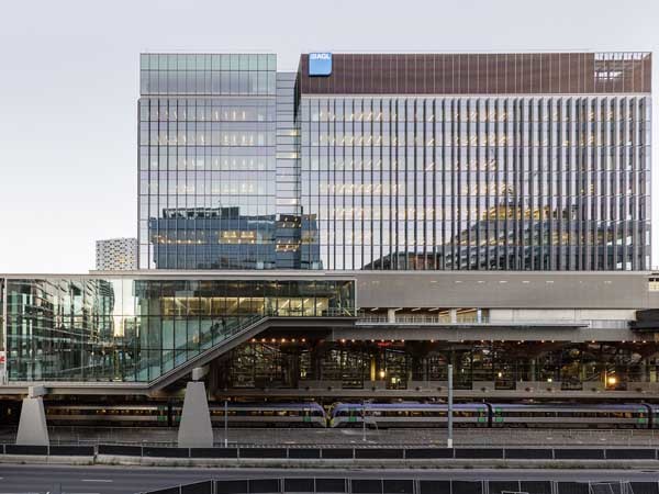 Grimshaw s first commercial building hovers over Melbourne rail