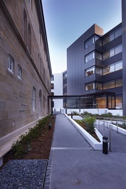 Besides smaller additions like new soffits and a lick of paint, Caritas House was left largely untouched on its exterior.