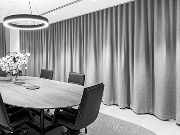 Companies with dedicated office meeting rooms have come to expect better performance with acoustic curtains