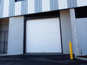 ISOtherm sectional overhead doors are made with insulated panels to provide high insulation against temperature and noise