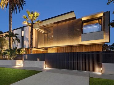 Kaynemaile screens provide privacy and solar shading for this contemporary home 
