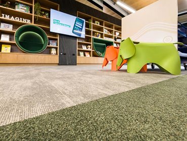 The carpet is designed to withstand the high volume of foot traffic that the library can attract