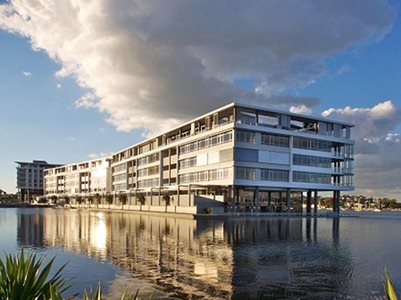 Exterior building facade over waterfront