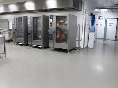 Interior of industrial kitchen with food grade flooring