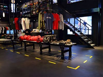 retail shop black floor yellow accent colour