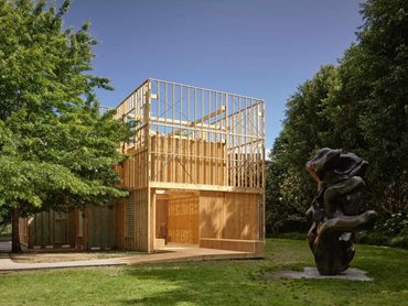 The external house frame represents the oversized silhouette of the average Australian home