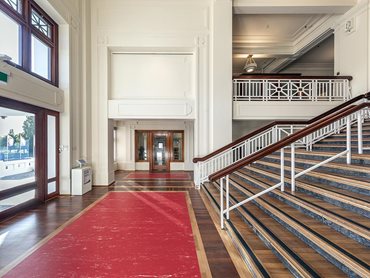 The foyer was reconstructed using salvaged jarrah wood from demolished houses