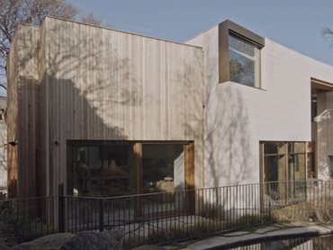 Shade Factor Limestone House Back Exterior