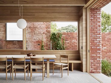 Ash Grey brick tiles pair well with the natural palette of timber and reclaimed red bricks