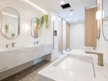 The architects chose Corian® Carrara Lino for its marble-like aesthetic