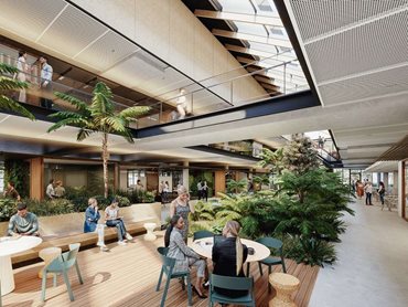 Fresh air is drawn into the open floorplan and out through a thermal chimney in the atrium, naturally ventilating the office