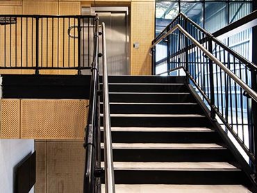 The balustrades were custom finished with a Dulux black powdercoat alongside an offset stainless steel handrail