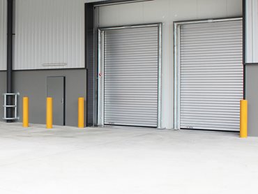 Insulated industrial doors play a crucial role in maintaining indoor temperatures and optimising energy usage within educational facilities