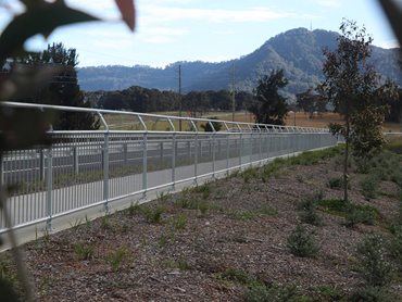 The barriers' smooth and continuous top rails are designed to reduce injury risks for pedestrians and cyclists