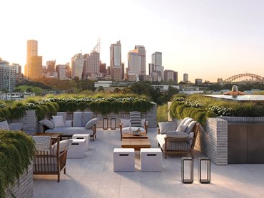 The communal rooftop features a residents-only pool and expansive vistas