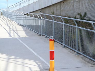 The bridge includes multiple pedestrian and cyclist access points, such as a shared pathway access ramp 