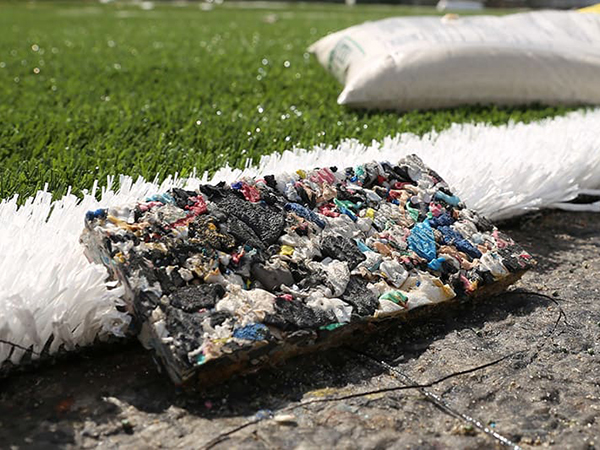 Adidas takes 1.8 million plastic bottles and turns them into a sports field