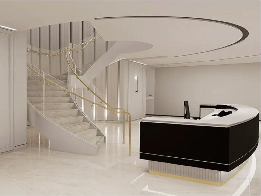 The helical staircase featuring TemperShield glass at French Fashion House