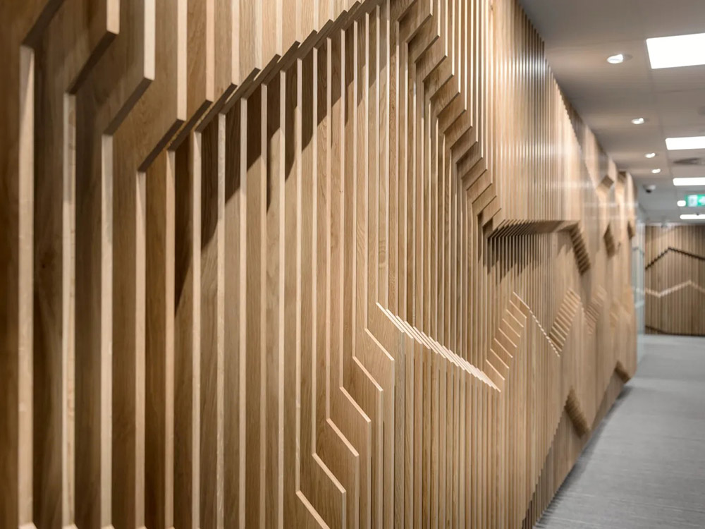 DecorSlat Max was used to create a striking feature of angled slatted beams throughout the space