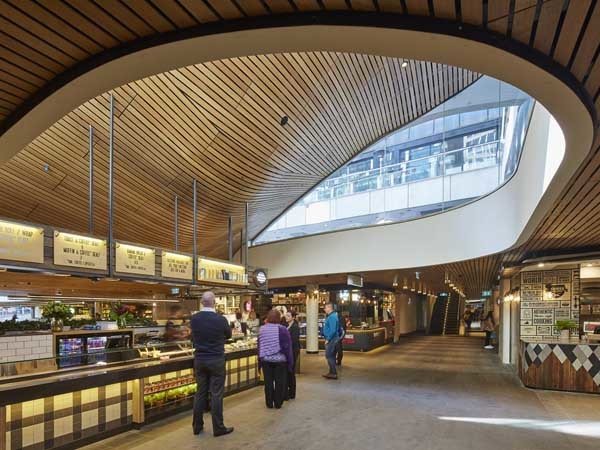 Undulating slatted timber ceiling a warm and welcoming feature ...