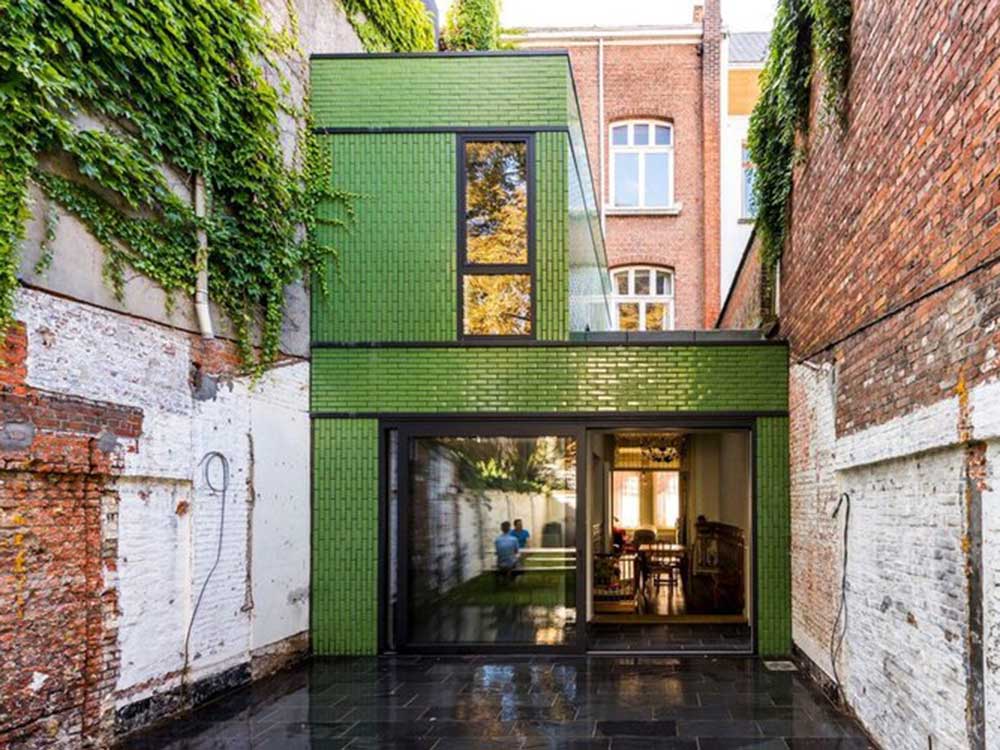 The Zurenborg home featuring green glazed bricks