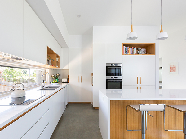 It’s signature elements are the Shou Sugi Ban cladding, which was beautifully installed by the owner, and a recycled hardwood slatted screen to the carport, which was made from the roof battens of the original cottage.